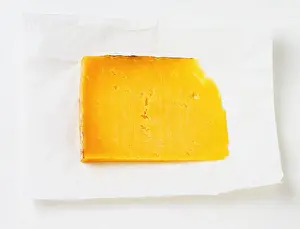 Somerset Prints: Thin slice of yellow cheddar cheese, close up