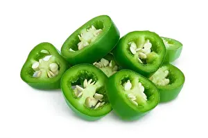 Chilli Prints: sliced jalapeno pepper isolated on white background