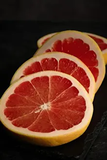 Pulp Prints: slices of cut grayfruit close-up