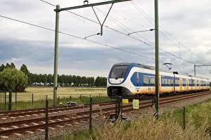Delay Prints: SLT sprinter local commuter train on track in Moordrecht in the Netherlands