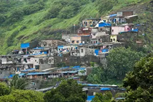 Monsoon Prints: Slum area housing on hillside in Chandivali, Mumbai, India