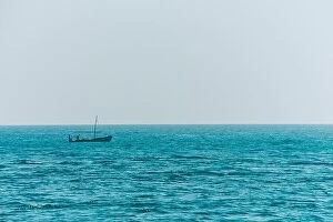 Images Dated 10th January 2017: Small boat fishing in endless ocean water
