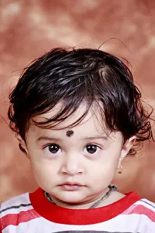 Chicks Prints: Small boy looking at camera ; India MR#749