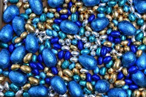 Easter Eggs Prints: Small pale and dark blue, silver and gold foil wrapped chocolate easter eggs