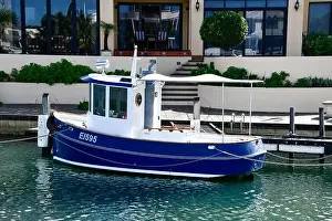 Underway Prints: Small Pleasure Craft Blue Tugboat in Mandurah Western Australia