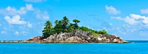 Seychelles Prints: Small rocky Island in the Indian ocean near Seychelles. Long wide banner