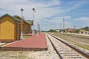 Depot Prints: Small town railroad depot passenger platform with tracks