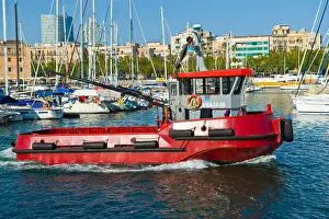 Espania Prints: Small tug in marina at Port Vell Barcelona Catalonia Spain ES