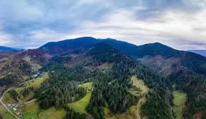 Dzembronya Prints: Small village in a mountain valley of the Carpathian Mountains on an autumn day in Ukraine in the village of Dzembronya