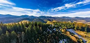 Dzembronya Prints: Small village in a mountain valley of the Carpathian Mountains on an autumn day in Ukraine in the village of Dzembronya