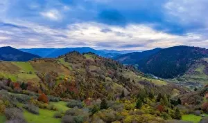Dzembronya Prints: Small village in a mountain valley of the Carpathian Mountains on an autumn day in Ukraine in the village of Dzembronya