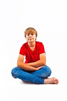 Tailor Prints: smart boy with red shirt sitting in tailor seat at the floor