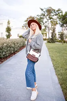 Knit Prints: Smiling beautiful blonde teenage girl 17-18 year old wear stylish hat