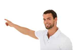 Grownup Prints: Smiling young guy pointing with finger. All on white background