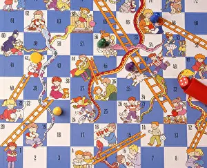 Board Game Prints: Snakes & Ladders board game with dice and counters (still-life)