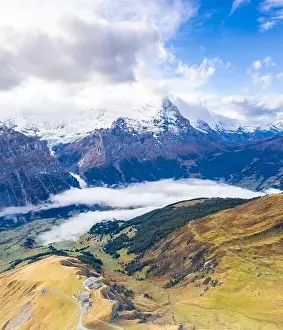 Bern Prints: Snow capped Eiger peak seen from the alpine villages of Grindelwald and First in autumn