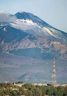 Catania Prints: Snow covered Mount Etna volcano and Catania city center at sunrise