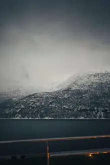 Brim Prints: Snowy arctic Lyngen Alps mountains under thick fog in Norway