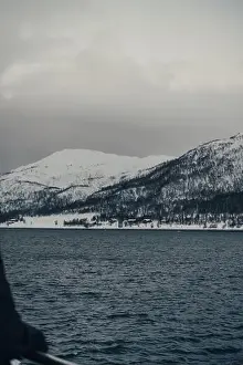 Snowy coastline in the Lyngen Alps in northern Norway arctic ocean