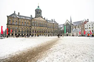 Dutch Holland Prints: Snowy Damsquare in Amsterdam the Netherlands in winter