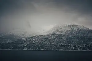 Whale Watching Prints: Snowy Lyngen Alps mountain view from boat in Norwegian fjord on tour from Tromso