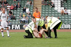 Leaving Prints: Soccer streaker. nude naked at Plymouth Argyle v Dundee United pre season friendly match