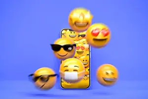 Face To Face Prints: Social Emdia concept: 3d Emojis escaping from a mobile phone. Motion blur