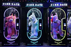 Claw Prints: Sofia, Bulgaria, November 27 2024: Prize machines with big teddy bears at the Christmas market in Sofia