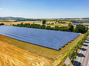 Solar Farm Prints: Solar farm with numerous rows of solar panels in a rural area in the south of Germany