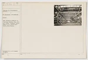 Men At Work Prints: Soldier painting the interior of the Carriage Machine Shop in Mehune-sur-Yevre