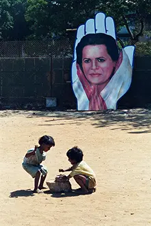 Billboards Prints: Sonia Gandhi poster cutout two children playing bombay mumbai maharashtra india asia