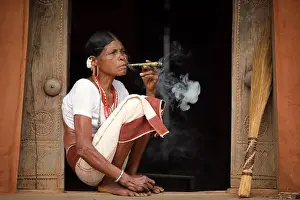 Saree Prints: Sora tribal woman in a rural village near Gunupur in Odisha, India