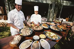 Medium Format Prints: South Africa, Magaliesburg, Men and women preparing food (Large format sizes available)