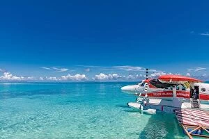 Images Dated 2nd November 2019: South Ari Atoll, Maldives - December 15 2019: Maldives airline seaplane near tropical islands in