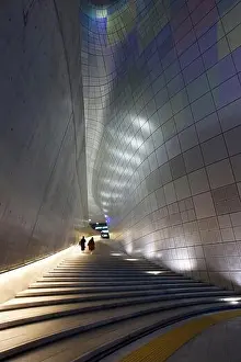 Bending Prints: South Korea, Seoul, people climbing a staircase in the middle of the Dongdaemun Design Plaza