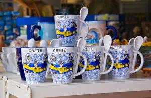 Cretan Prints: Souvenir mugs in gift shop in Malia on the Greek Mediterranean island of Crete GR EU