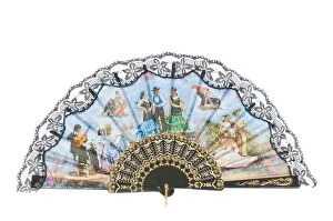 Images Dated 23rd November 2023: A Spanish hand held fan cheap holiday souvenir on a pure white (255) background