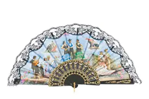 Frills Prints: A Spanish hand held fan cheap holiday souvenir on a pure white (255) background
