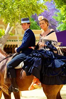Riders Prints: Spanish horse riders in traditional dress at annual Horse Fair