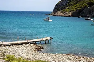 The Spanish island of Ibiza showing the beautiful beach front and board walk