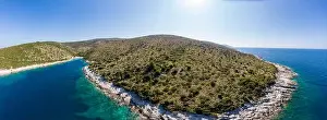 Spectacular aerial sea landscape of rocky coast and crystal clear water