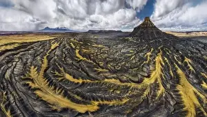 Uneven Prints: Spectacular aerial view of rough surface of rocky formations of Factory Butte located in Utah