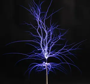 Spark Prints: Spectacular electric arc discharge from a Tesla coil with branching sparks in the dark