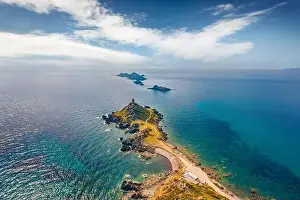 Splendid Prints: Spectacular spring view from flying drone of popular tourist destination Torra di a Parata - 16th-century Genoese tower