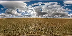 spherical 360 hdri panorama among farming field with clouds on blue sky in equirectangular seamless projection