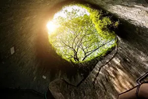 Spiral staircase of underground crossing in tunnel at Fort Canning Park, Singapore