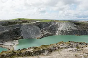 Quarry Prints: Spoil heaps alongside water filled china-clay pit on edge of Dartmoor