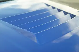 Hood Prints: Spoiler on car. Blue hood. Transport details. Sports car