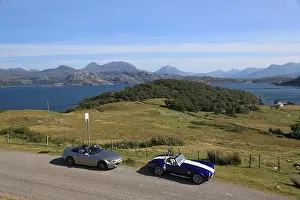 Convertible Prints: Two sports cars parked on the North coast 500 route, Scotland, UK