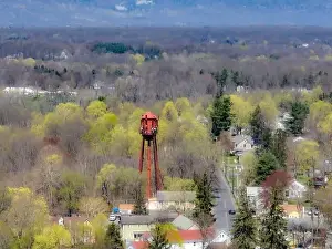 Water Tower Prints: Spring afternoon aerial photo of the water tower located in the hamlet of Wallkill